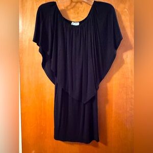 Like new! LSJ small black dress. Can be worn on or off shoulders. Runs big.